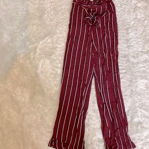 Burgundy, black, and white striped casual pants